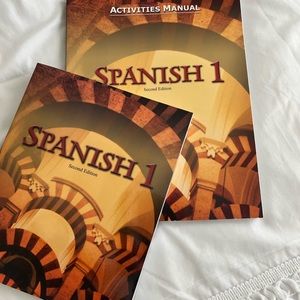 Spanish 1 textbook and activity manual.